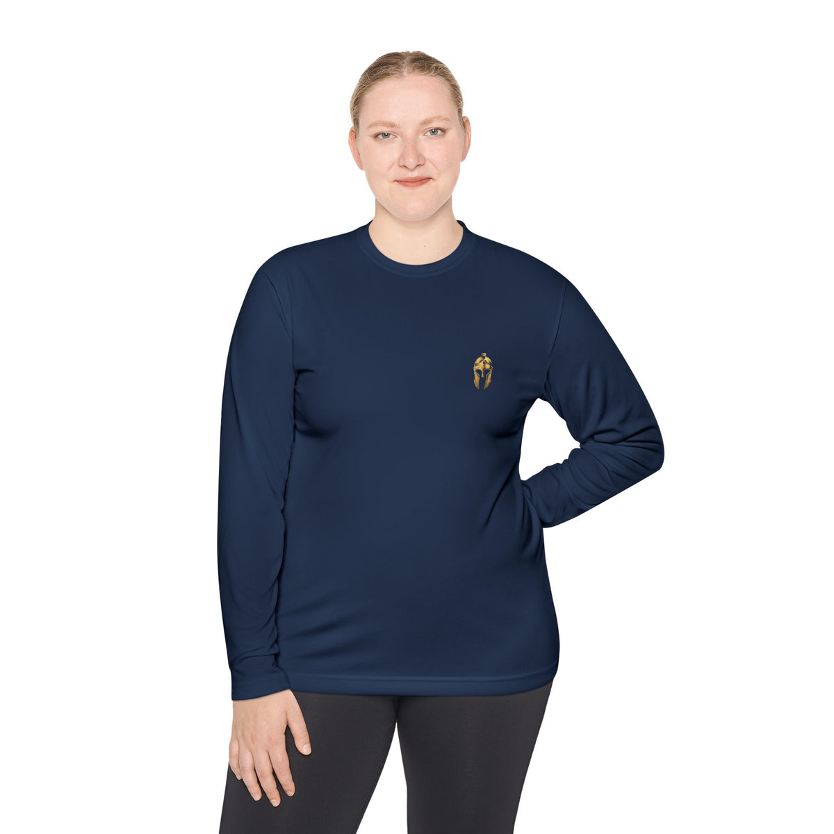 Woman wearing true navy performance long sleeve with the gold Helm helmet on the chest