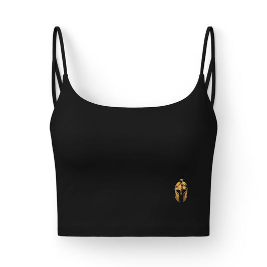 Black women's sports bra with a small gold Helm helmet on the front