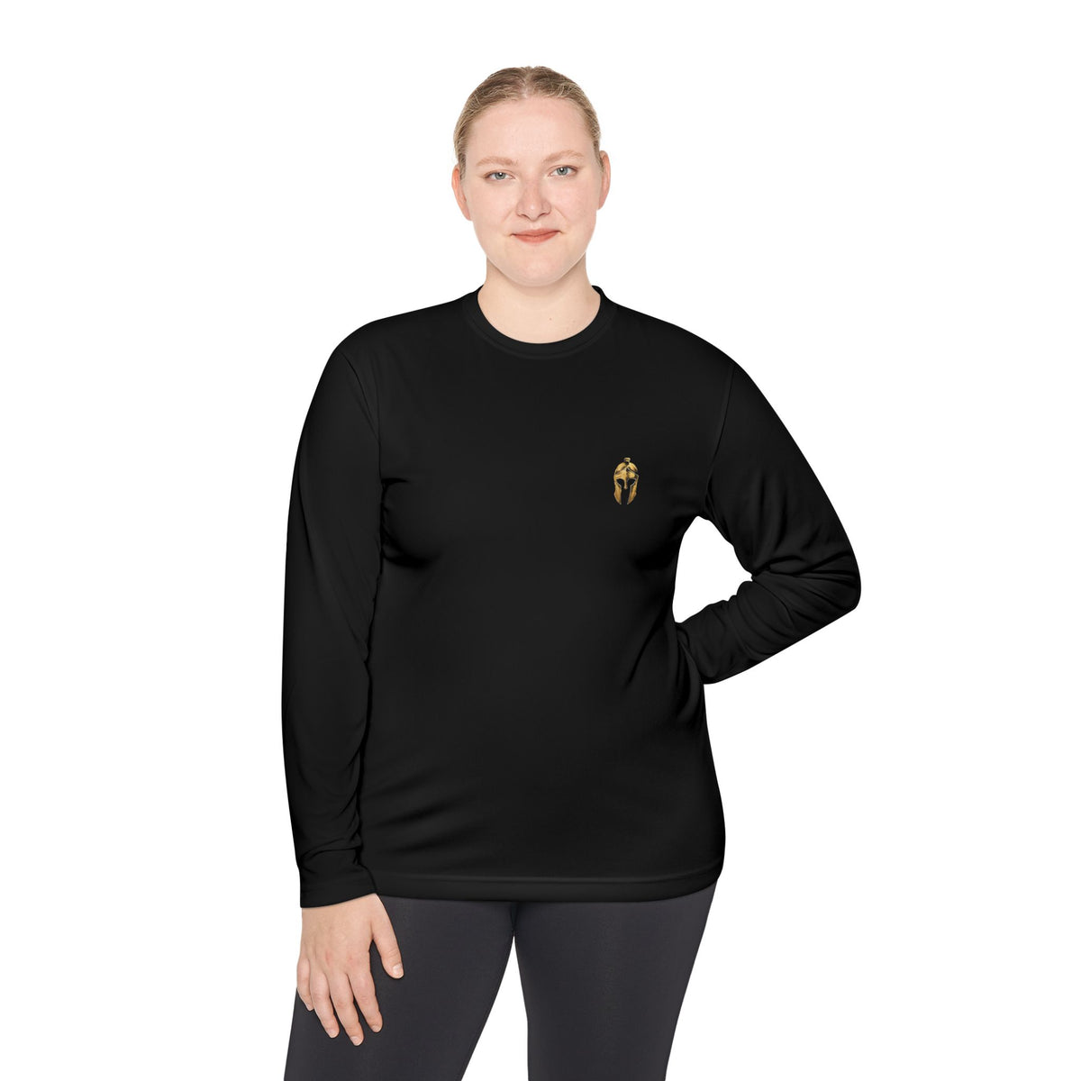 Woman wearing black performance long sleeve with the gold Helm helmet on the chest