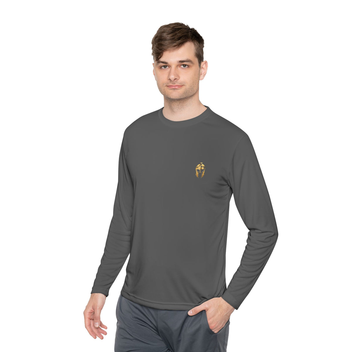 Man wearing iron grey men's performance long sleeve with the gold Helm helmet on the chest