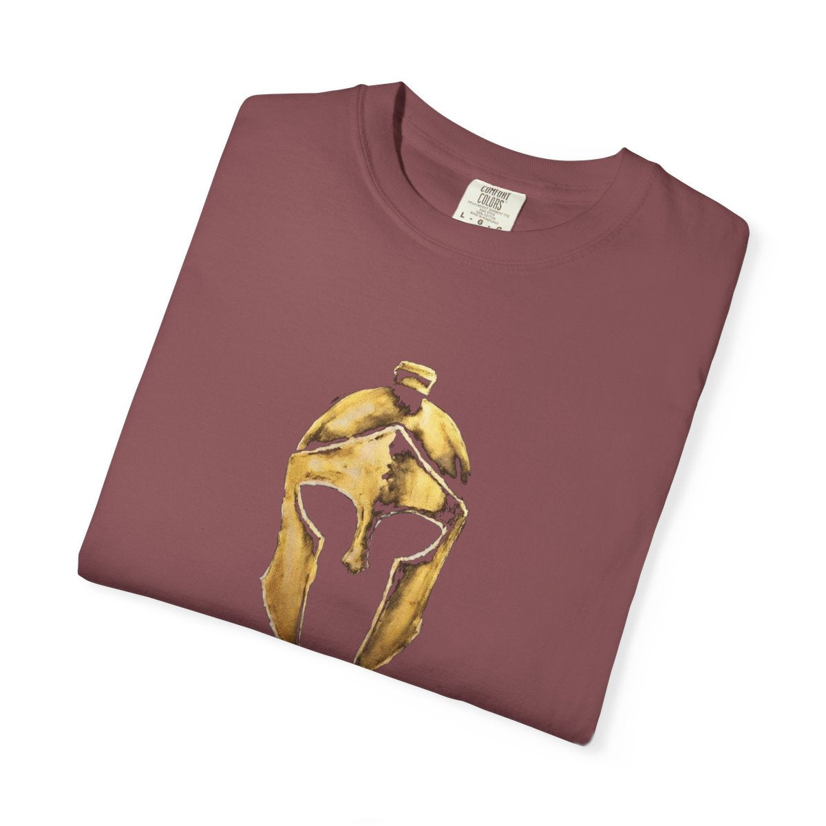 Folded brick casual tee showing the gold Helm helmet