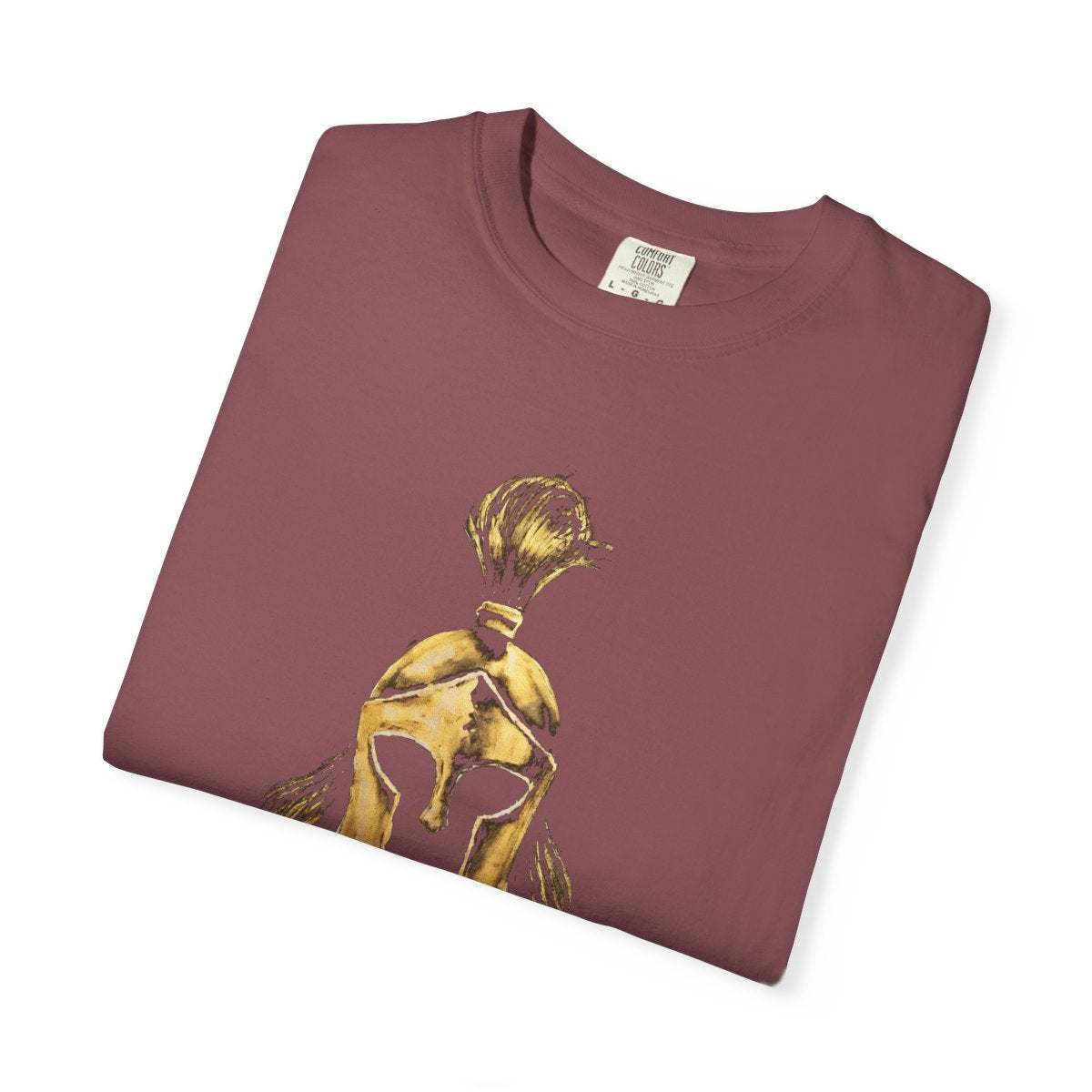 Folded brick casual tee showing the gold Sentinel helmet