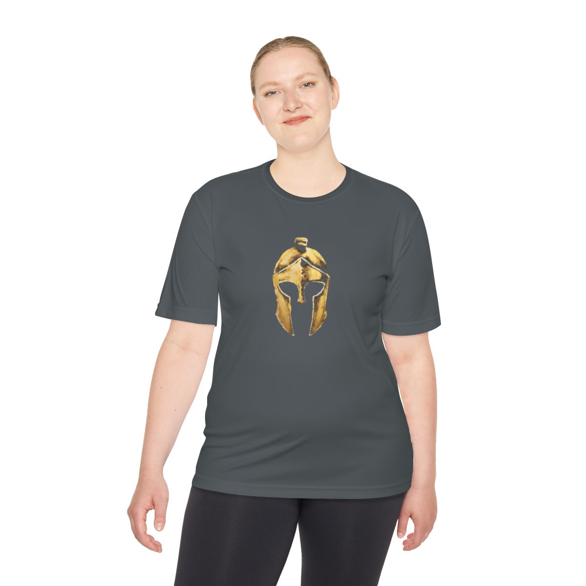 Woman wearing iron grey performance tee with the gold Helm helmet on the front