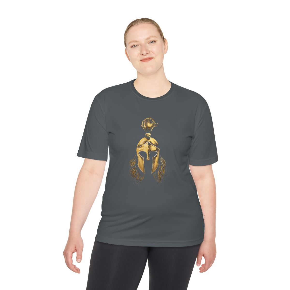 Woman wearing iron grey performance tee with the gold Sentinel helmet on the front