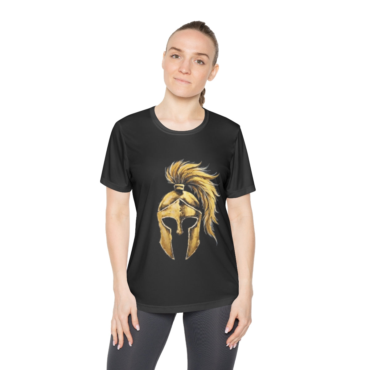 Woman wearing black women's performance tee with the gold Aquila helmet on the front