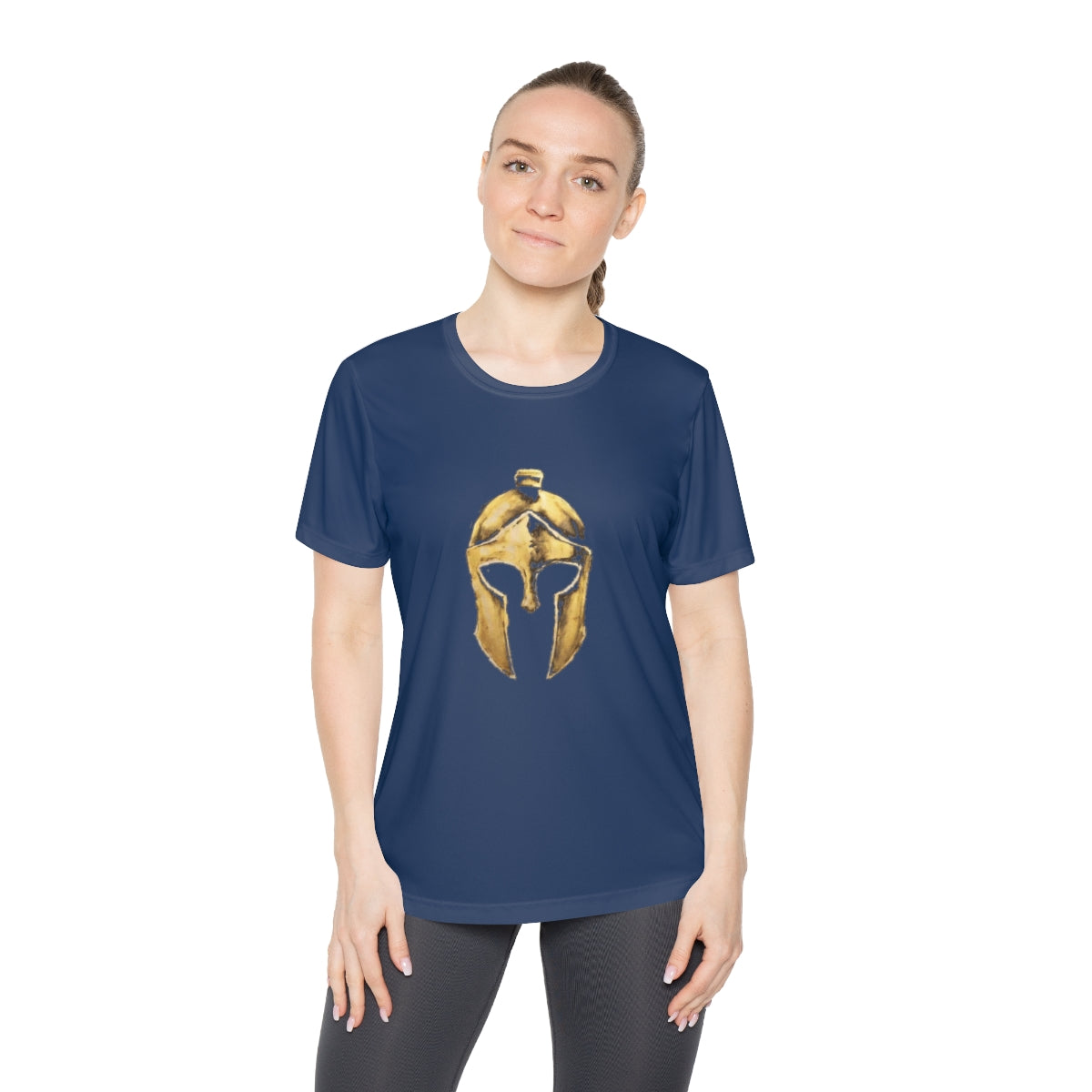 Woman wearing true navy women's performance tee with the gold Helm helmet on the front