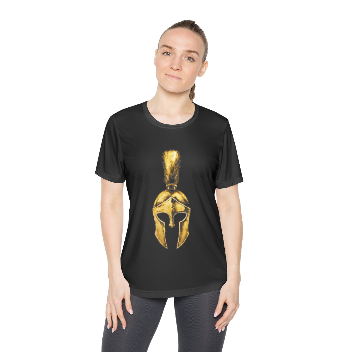 Woman wearing black women's performance tee with the gold Praetorian helmet on the front